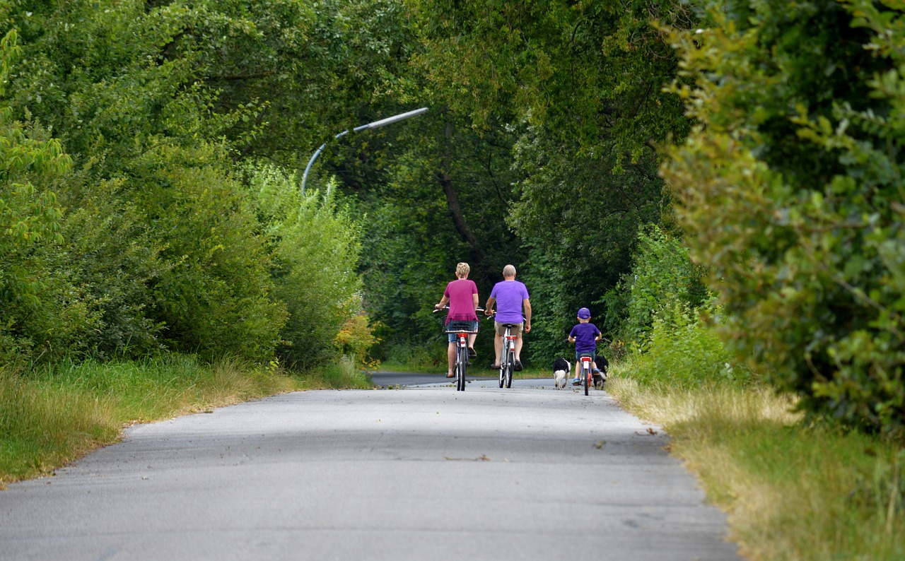 road bike rental lugano a family of mom, dad, and child enjoy road bike rental lugano experience in the countryside
