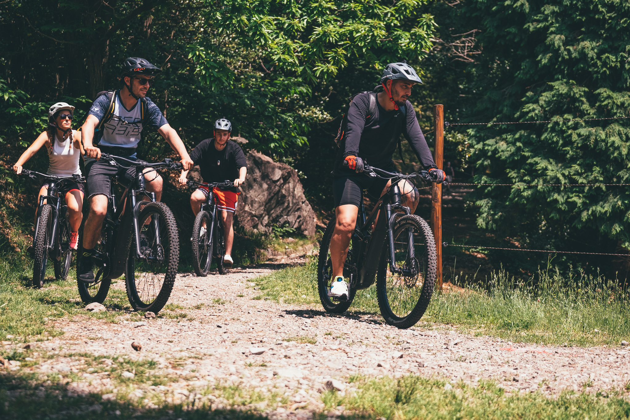 bike tour lugano a group of people on a country road in switzerland participate to a bike tour lugano